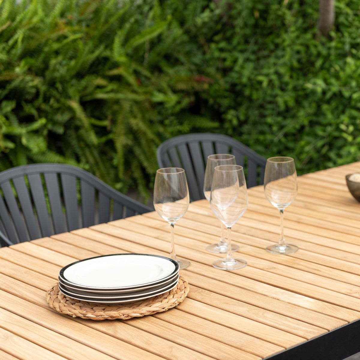 Portals Dark Rectangular Teak Table and 6 Nassau Black Aluminum Dining Set