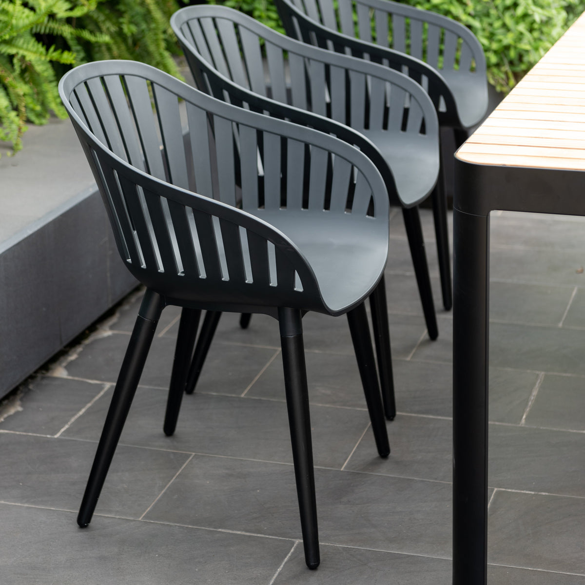 Portals Dark Rectangular Teak Table and 6 Nassau Black Aluminum Dining Set