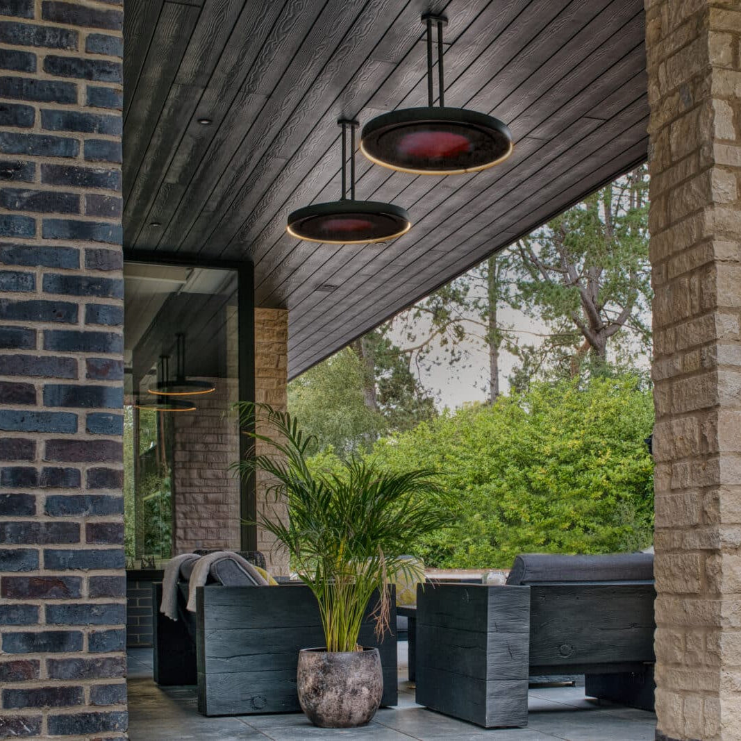 Bromic Eclipse twin pole ceiling installation in an outdoor living area