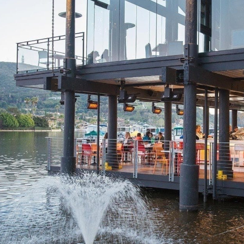 Outdoor bar with Bromic gas heaters mounted from ceiling poles