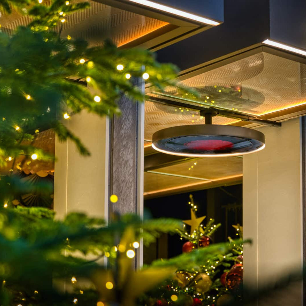 Bromic Eclipse close-to-ceiling installation at an outdoor hotel space