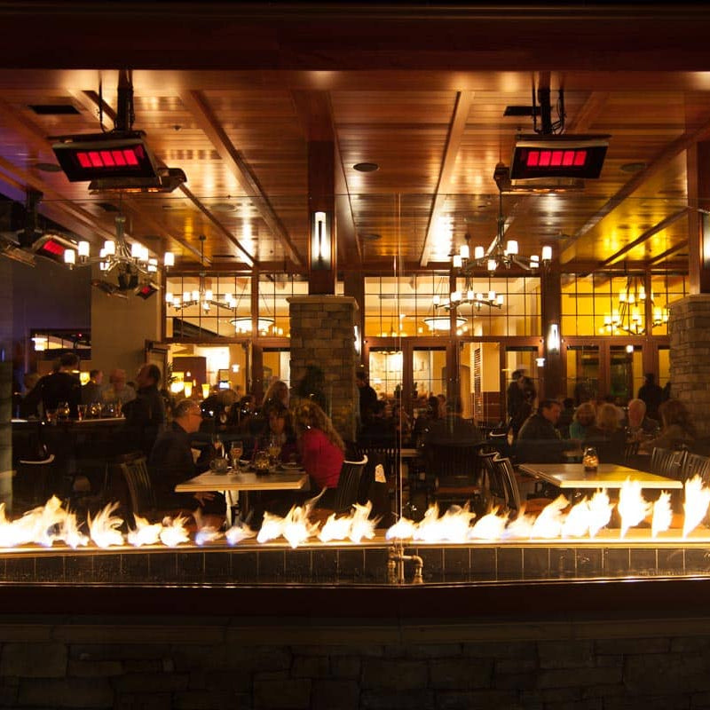 Hotel patio with Bromic Platinum Gas pole-mounted heaters