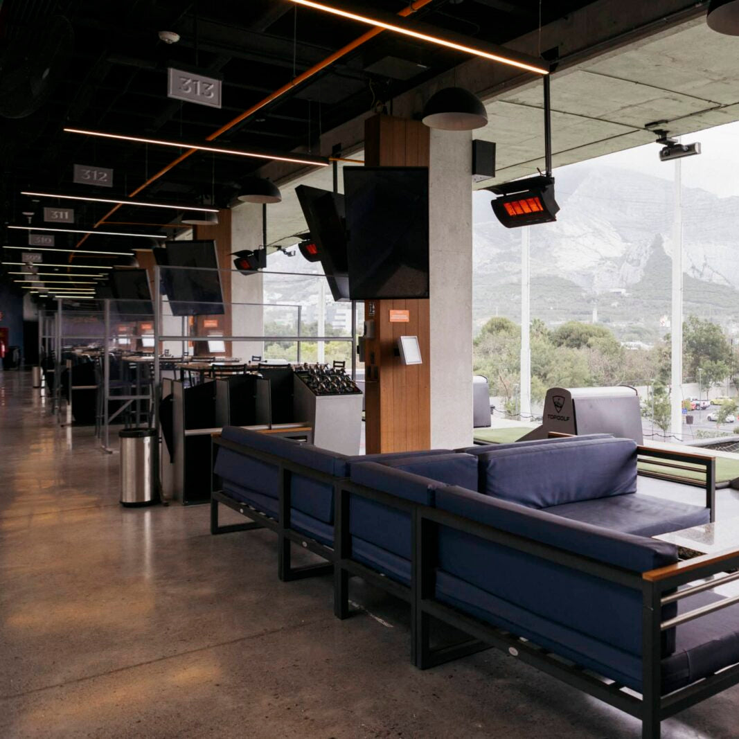 Bromic Tungsten Gas heater suspended over an outdoor entertainment area